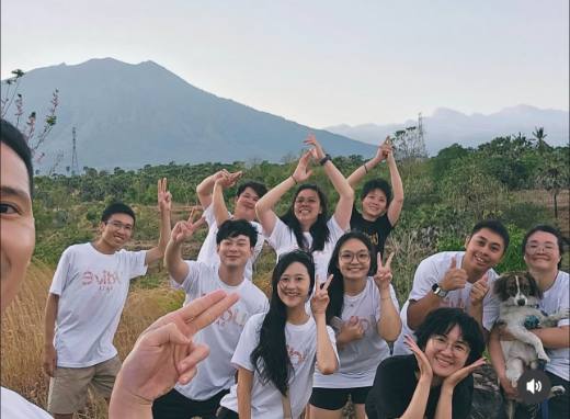 UDive Bali team group selfie with Mount Agung view